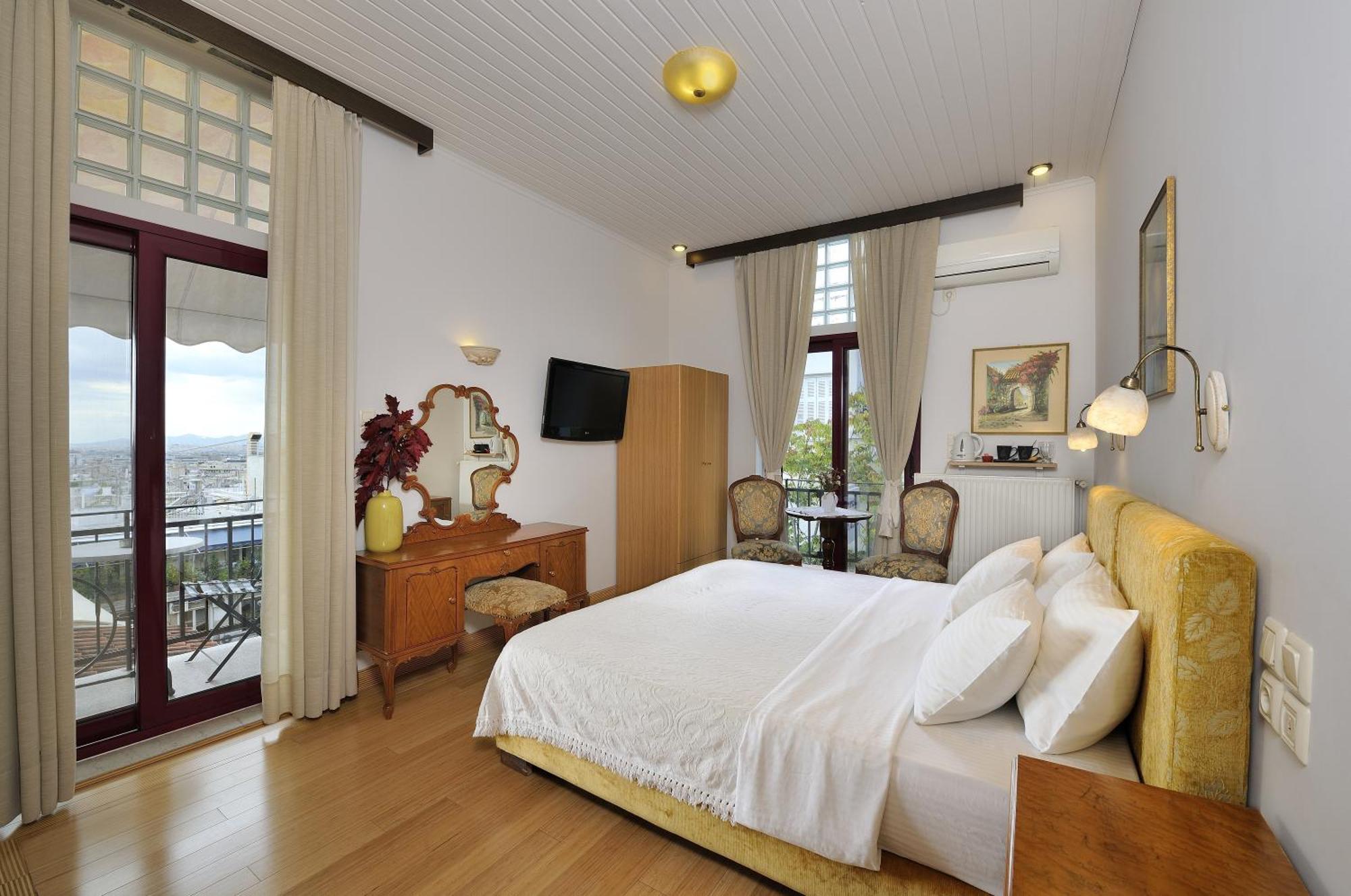 Quarto com Cama de Casal ou 2 de Solteiro - Vista de Acrópoles